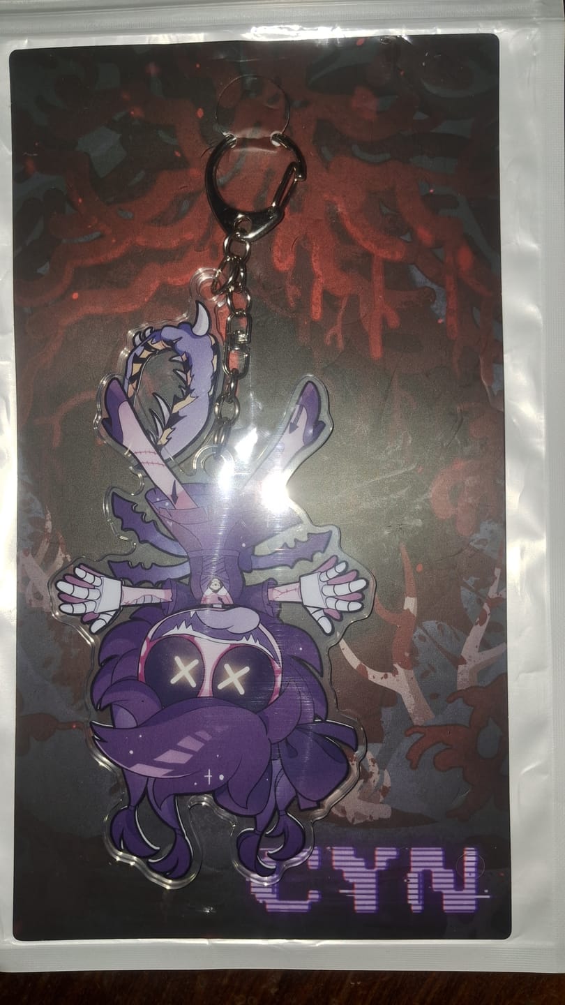 Customer photo review of Cyn Hang Tail Keychain