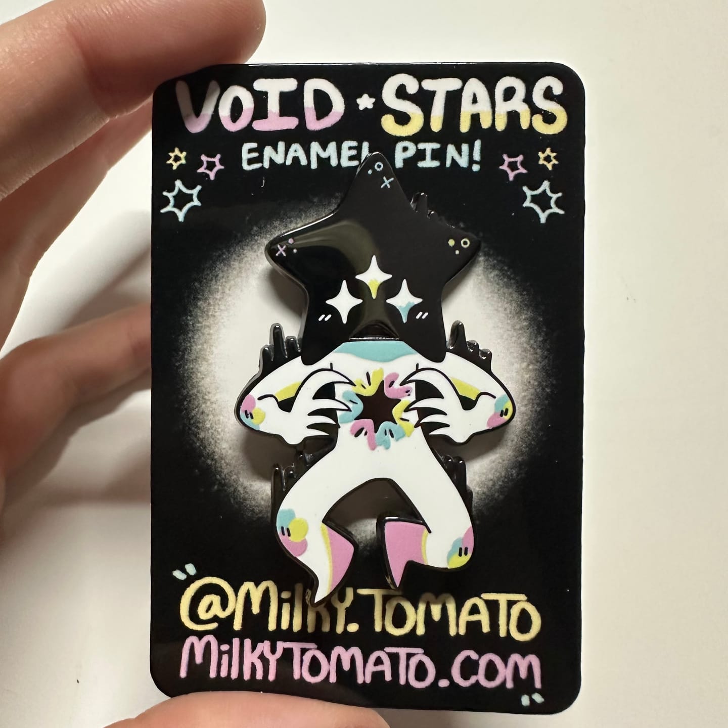 Customer photo review of Void Star Baby Enamel Pin