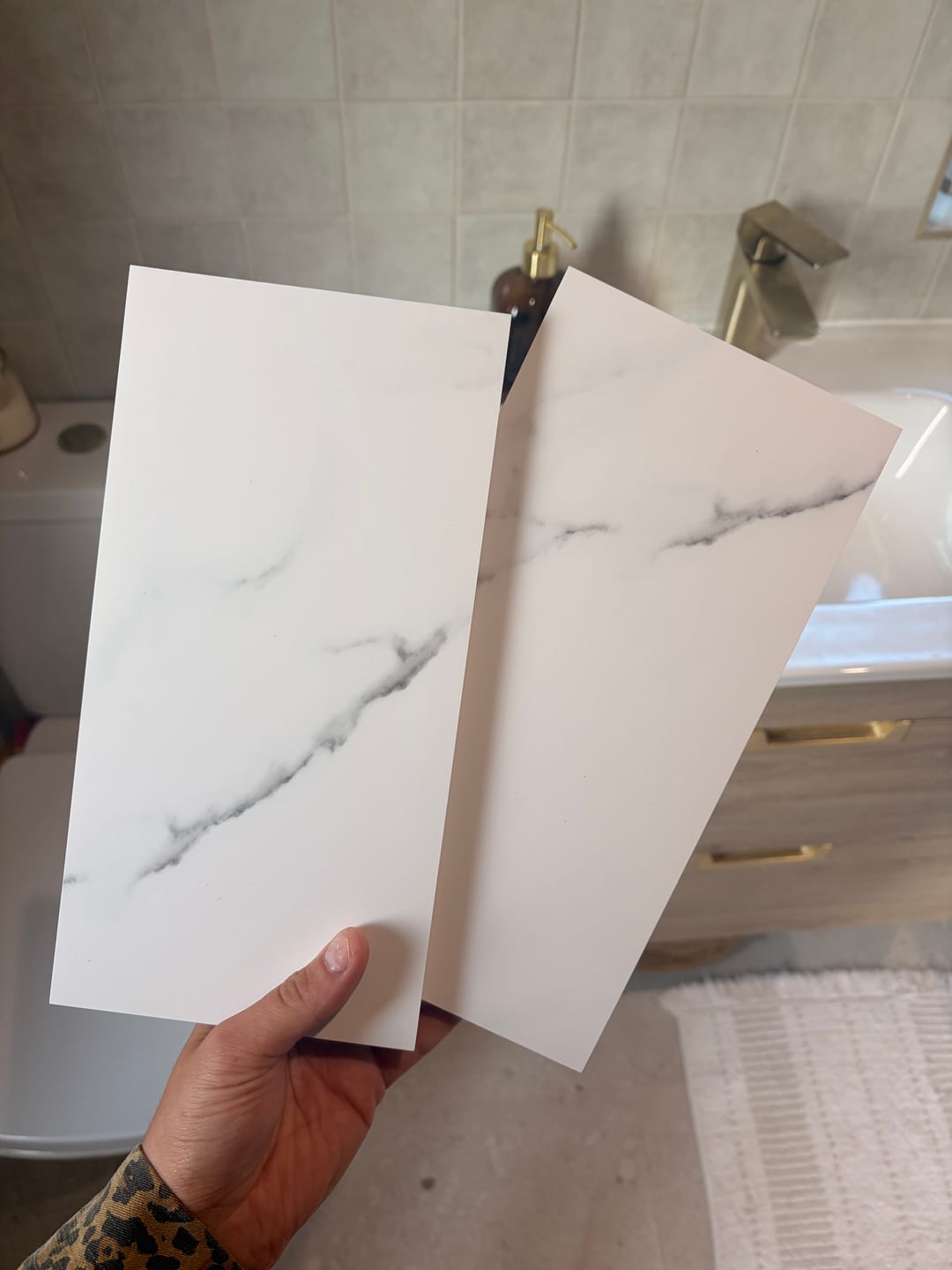 Customer photo review of Sivara Carrara White Marble PVC Waterproof Shower Panel