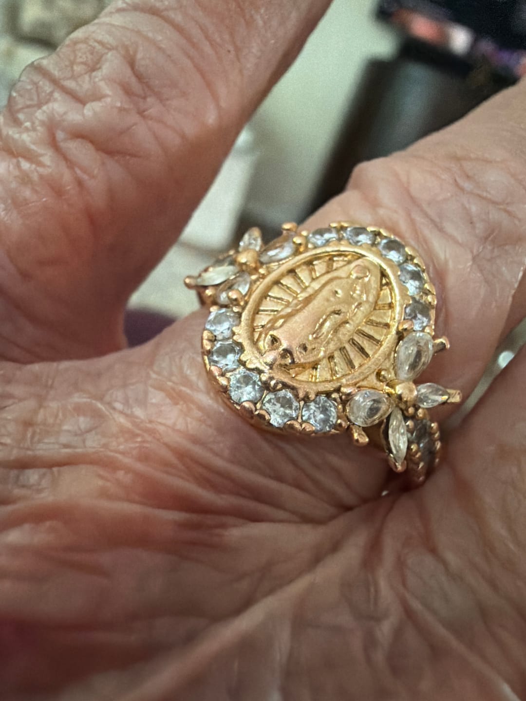 Customer photo review of Christianartworkshop Elegant Virgin Mary Emblem Ring: Sacred Detail for Daily Devotion