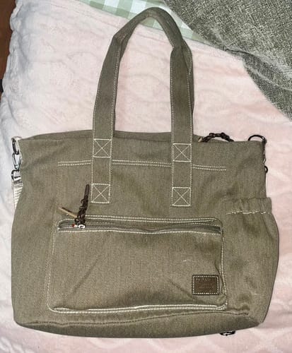Reseña con foto de un cliente sobre Bolso Notebook Canvas Lavado