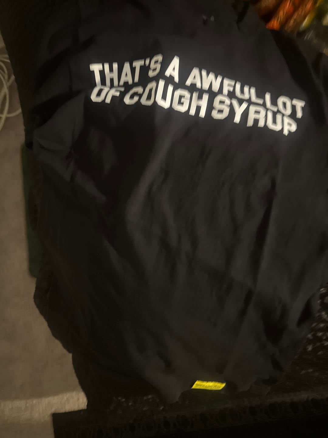 Customer photo review of Awful Lot of Cough Syrup Black Spell Out Tee