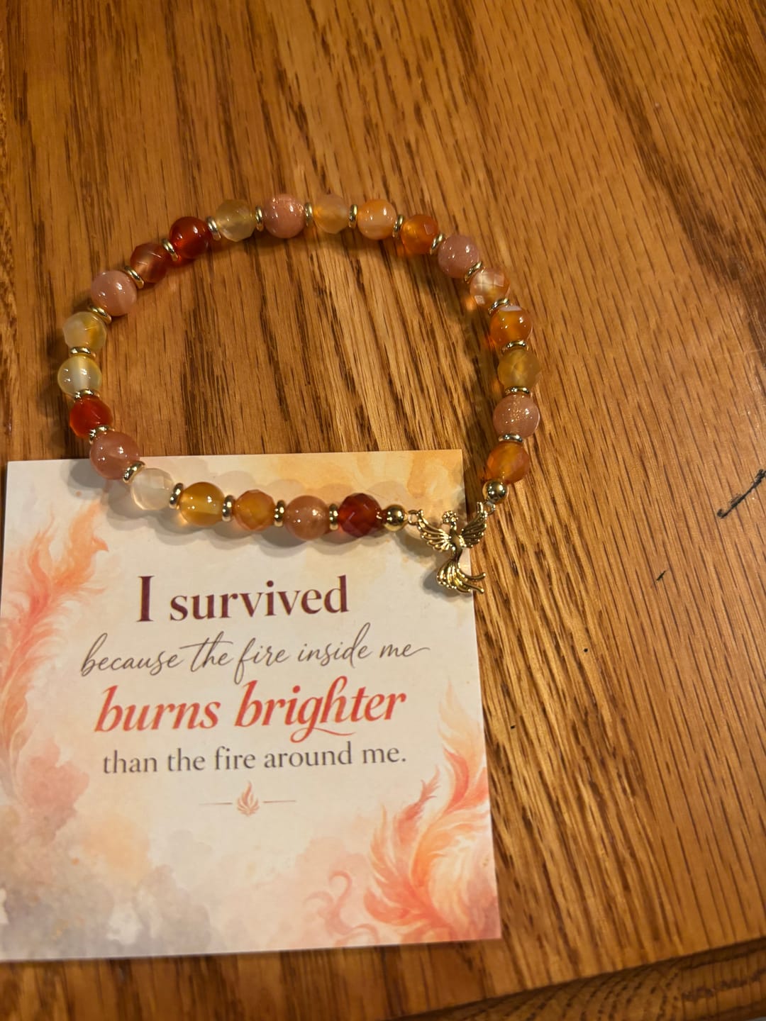Customer photo review of Phoenix Charm Crystal Energy Bracelet
