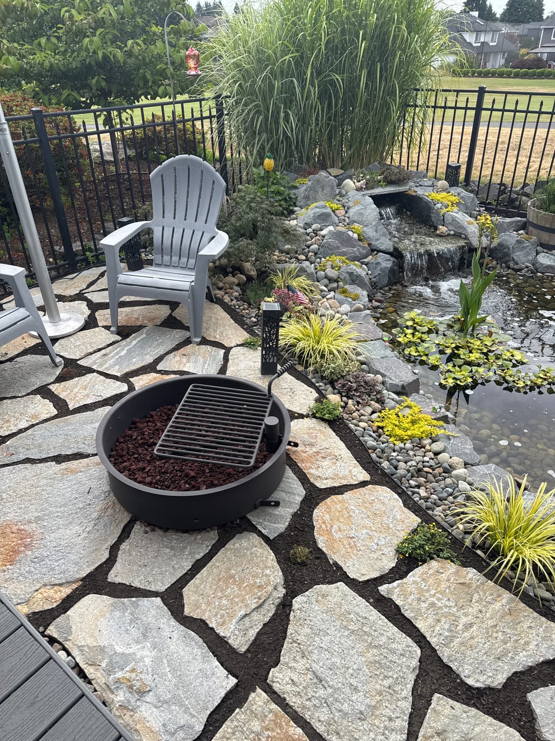 Customer photo review of Commercial 32 Inch Campfire Ring with Swivel Cooking Grate – Heavy Duty Steel