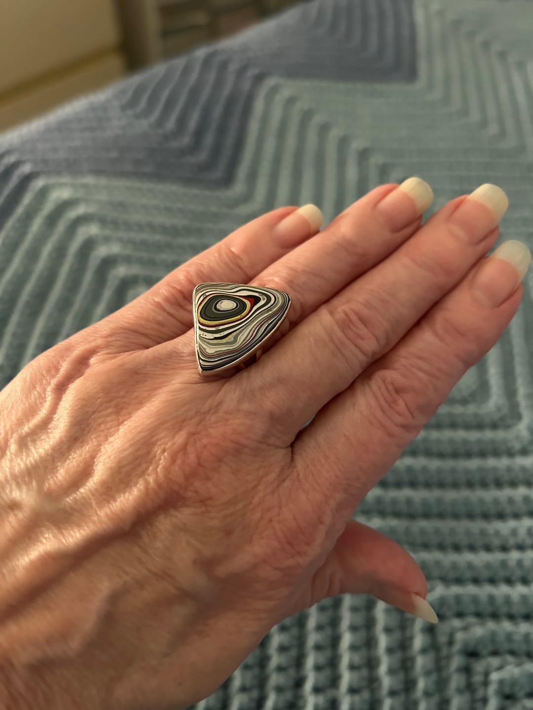 Customer photo review of Premium Fordite Ring Size 6.75 (.925 Sterling Silver)