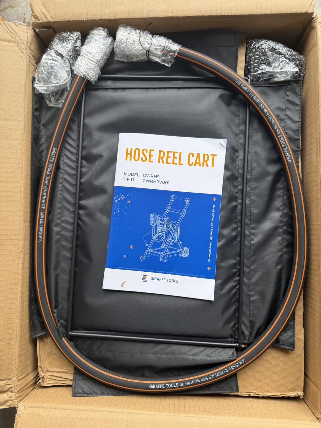 Customer photo review of Garden Hose Reel Cart with Tool Tray