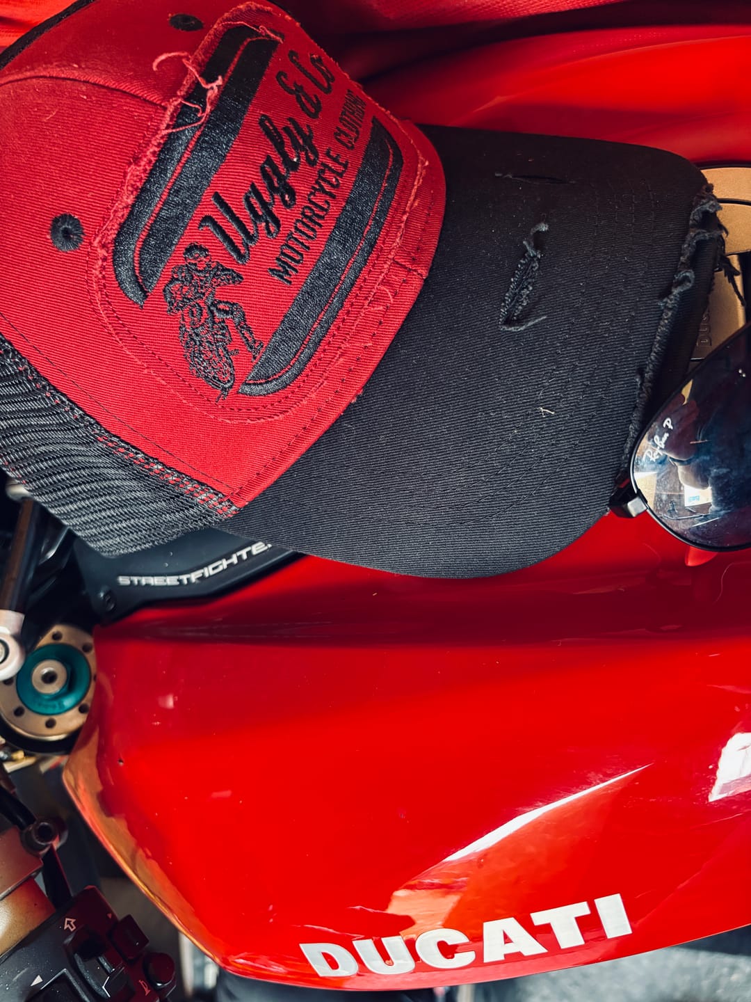 Customer photo review of Black & Red Flat Track Trucker Hat