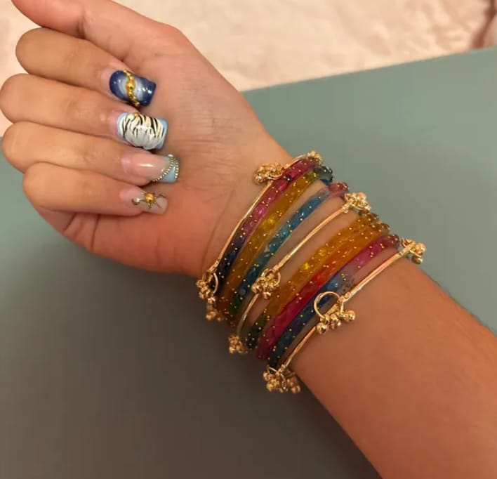 Customer photo review of Multicolor Kashmiri Ghungroo Bangles Set | Ghungroo Gold Bangles | Rainbow Glass Bridal Churiya | Trending Raindrop Bangles