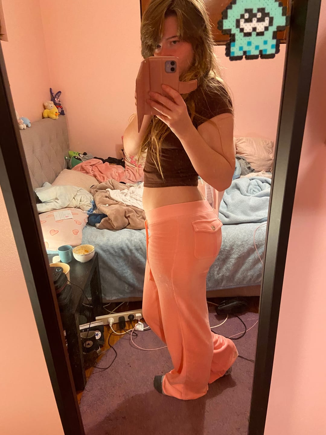 Customer photo review of Superlow Trackpants in Blush Pink
