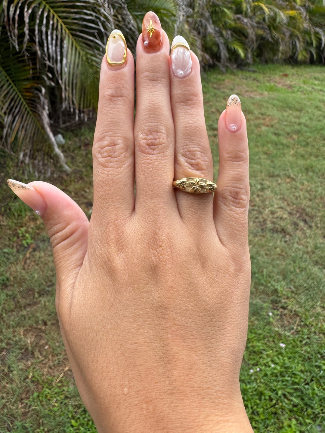 Customer photo review of Surfboard Plumeria Monstera Ring