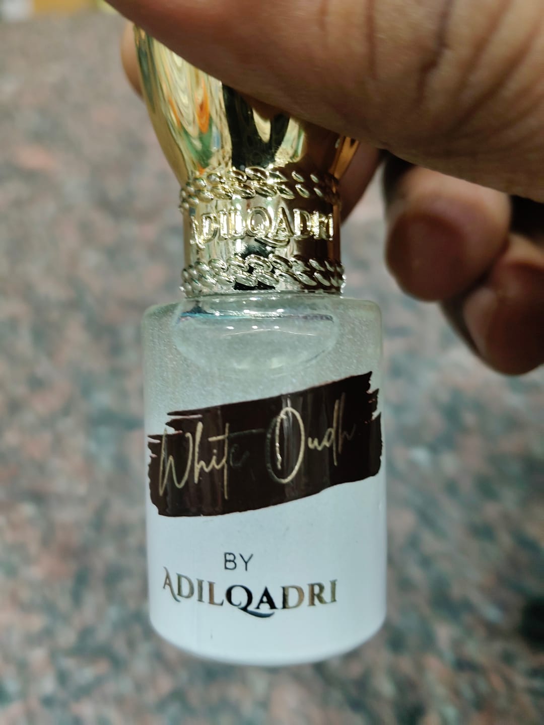 Customer photo review of White Oudh Luxury Attar Perfume
