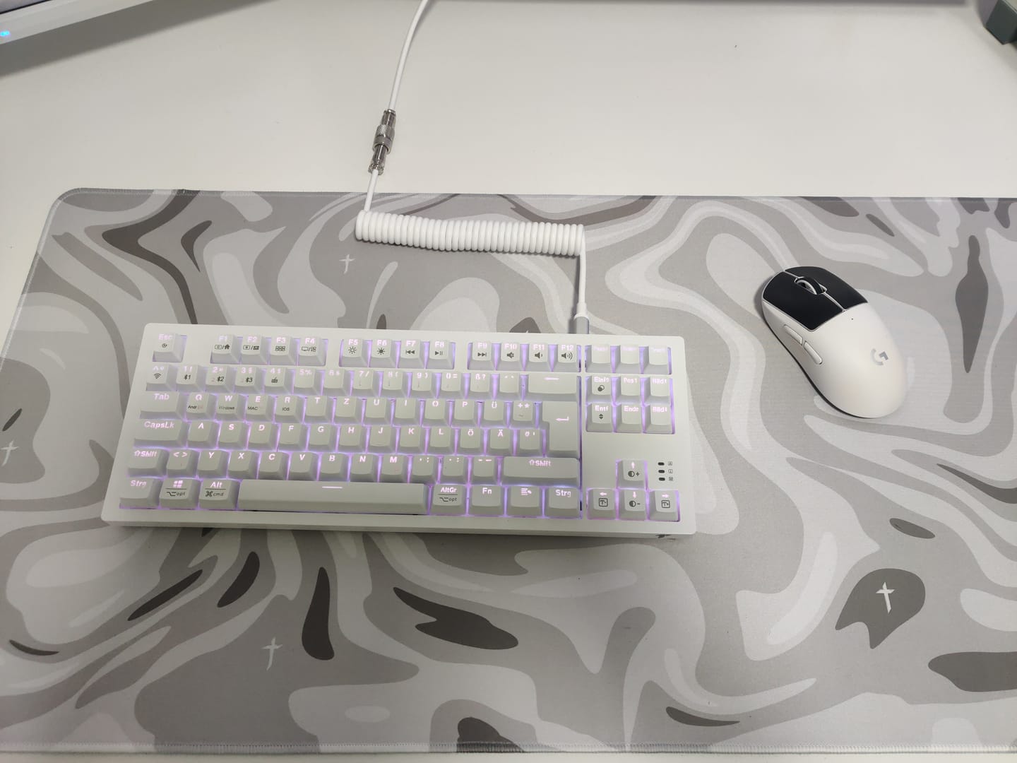 Customer photo review of Liquid White Mousepad