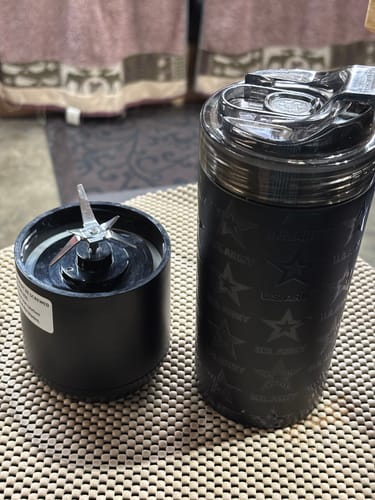 Customer's black Universal XL cup with a U.S. Army pattern, shown with its lid and blender attachment.