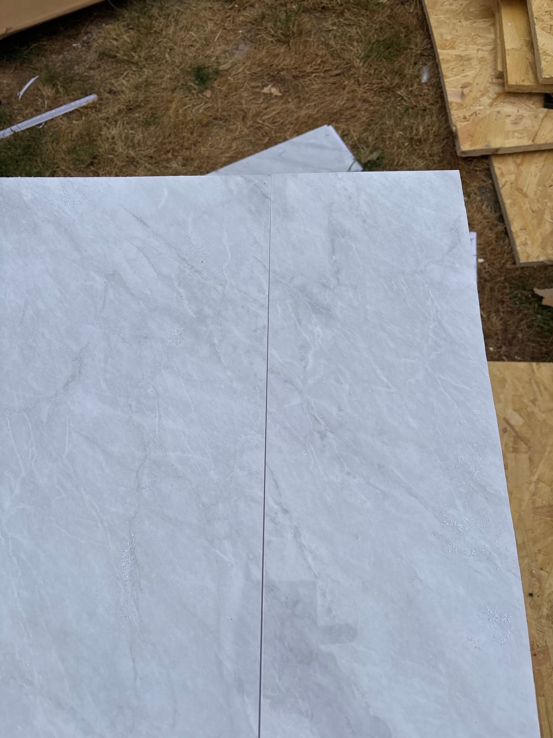 Customer photo review of Premium Grey Concrete Matt Shower Wall Panel - 1M x 2.4M