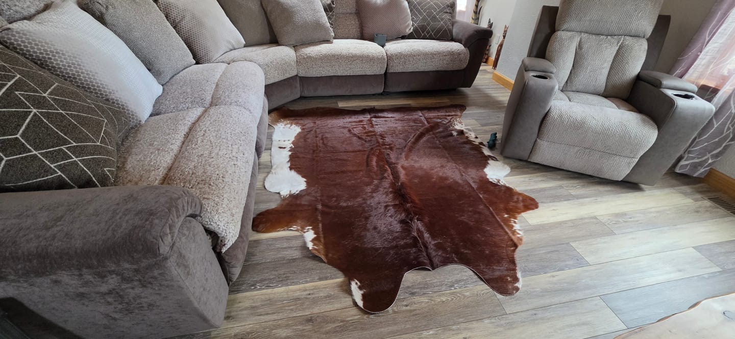 Customer photo review of SUPER SALE Brown & White Natural Cowhide Rug - XX-Large 7' 5"H x 6' 9"W