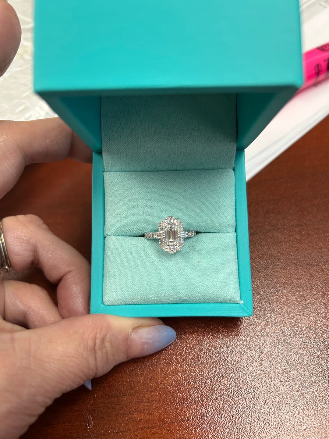 Customer photo review of Art Deco Emerald Cut Moissanite Milgrain Engagement Ring