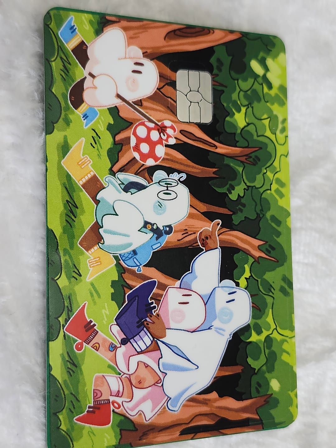 Customer photo review of Runaway Ghosts Credit Card Skins