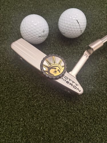 Customer photo review of Liberty — Black Stainless Golf Ball Marker
