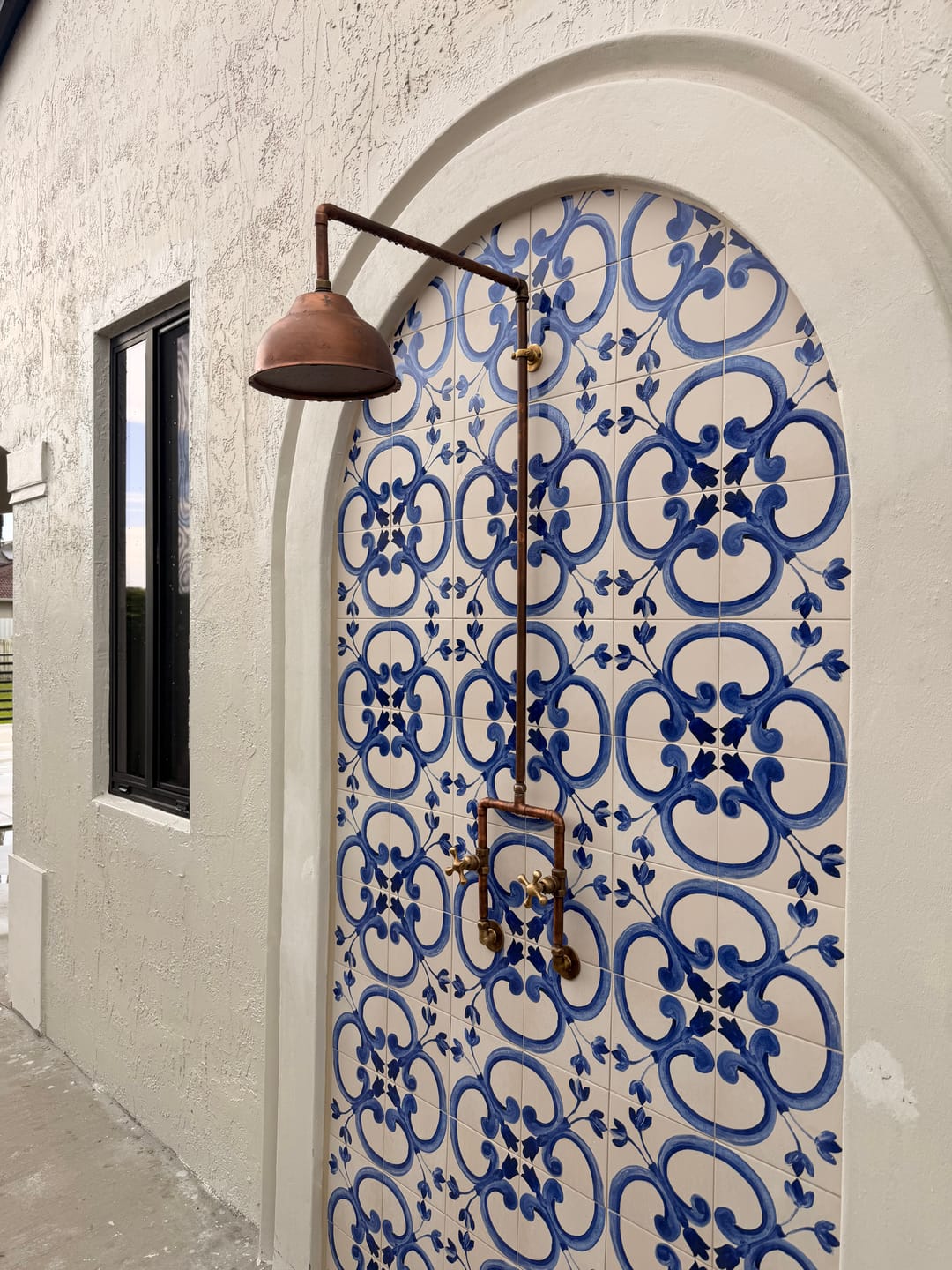 Customer photo review of Handcrafted Outdoor Copper Rain Shower – Wall-Mounted Rustic Shower with Cross Handles