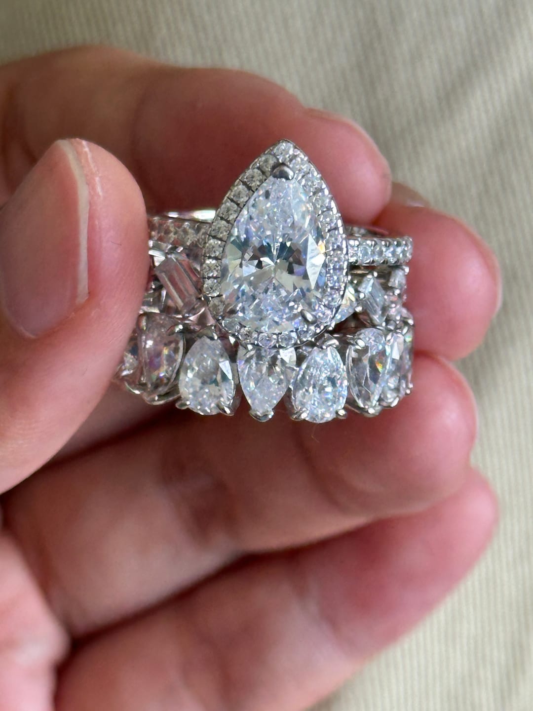 Customer photo review of S925 2.2 Carat Halo Pear Cut Wedding Ring Set With Two Luxurious Wedding Bands For Women