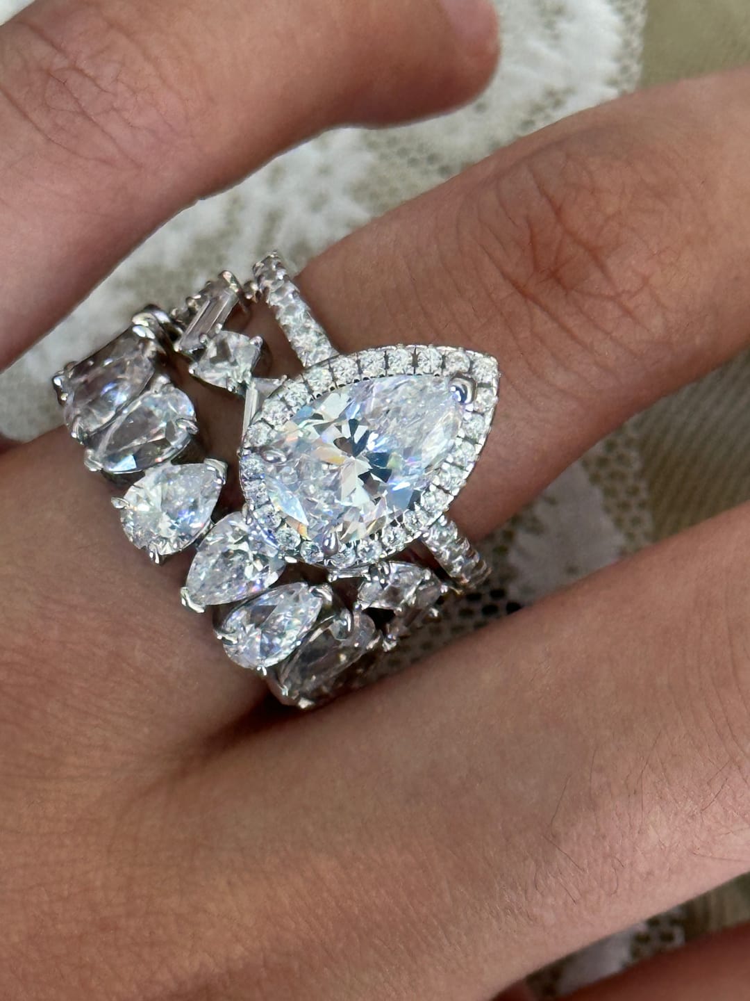 Customer photo review of S925 2.2 Carat Halo Pear Cut Wedding Ring Set With Two Luxurious Wedding Bands For Women