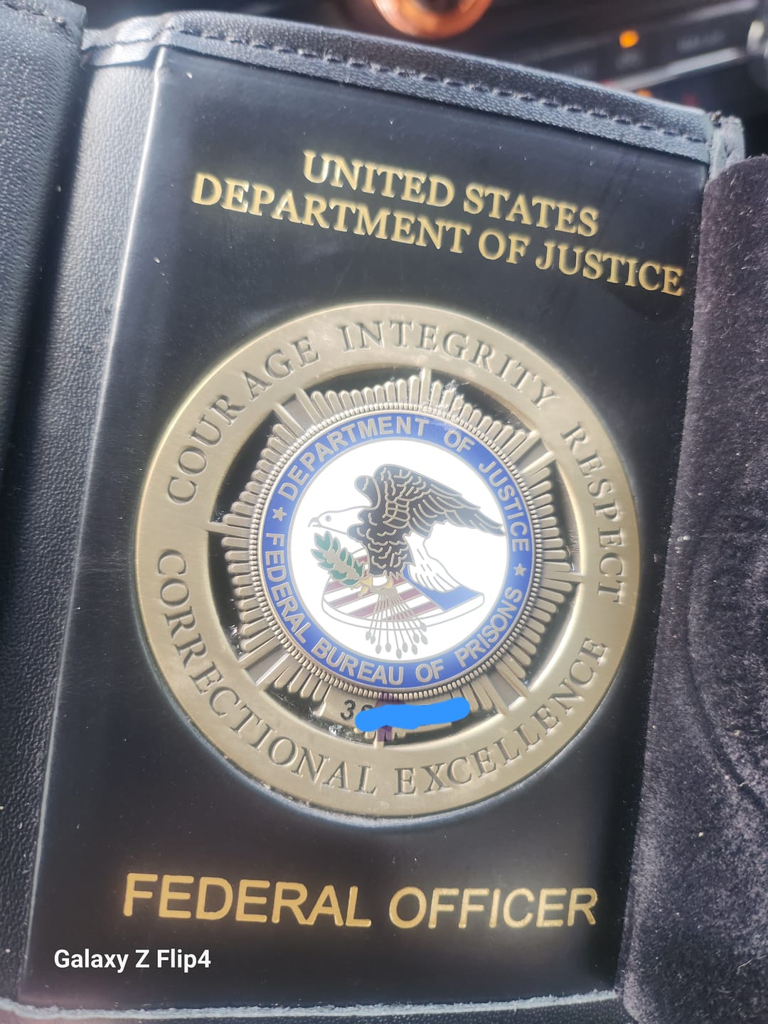 Customer photo review of Department Of Justice Federal Bureau Of Prisons Badge Customizable Number