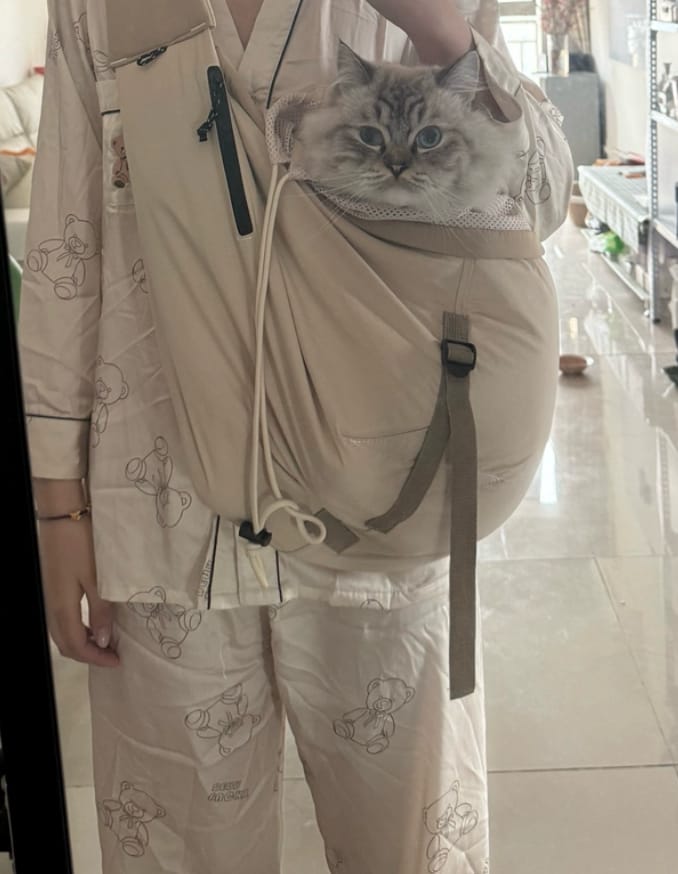 Customer photo review of Ergonomic Portable Hands-Free Pet Sling Carrier