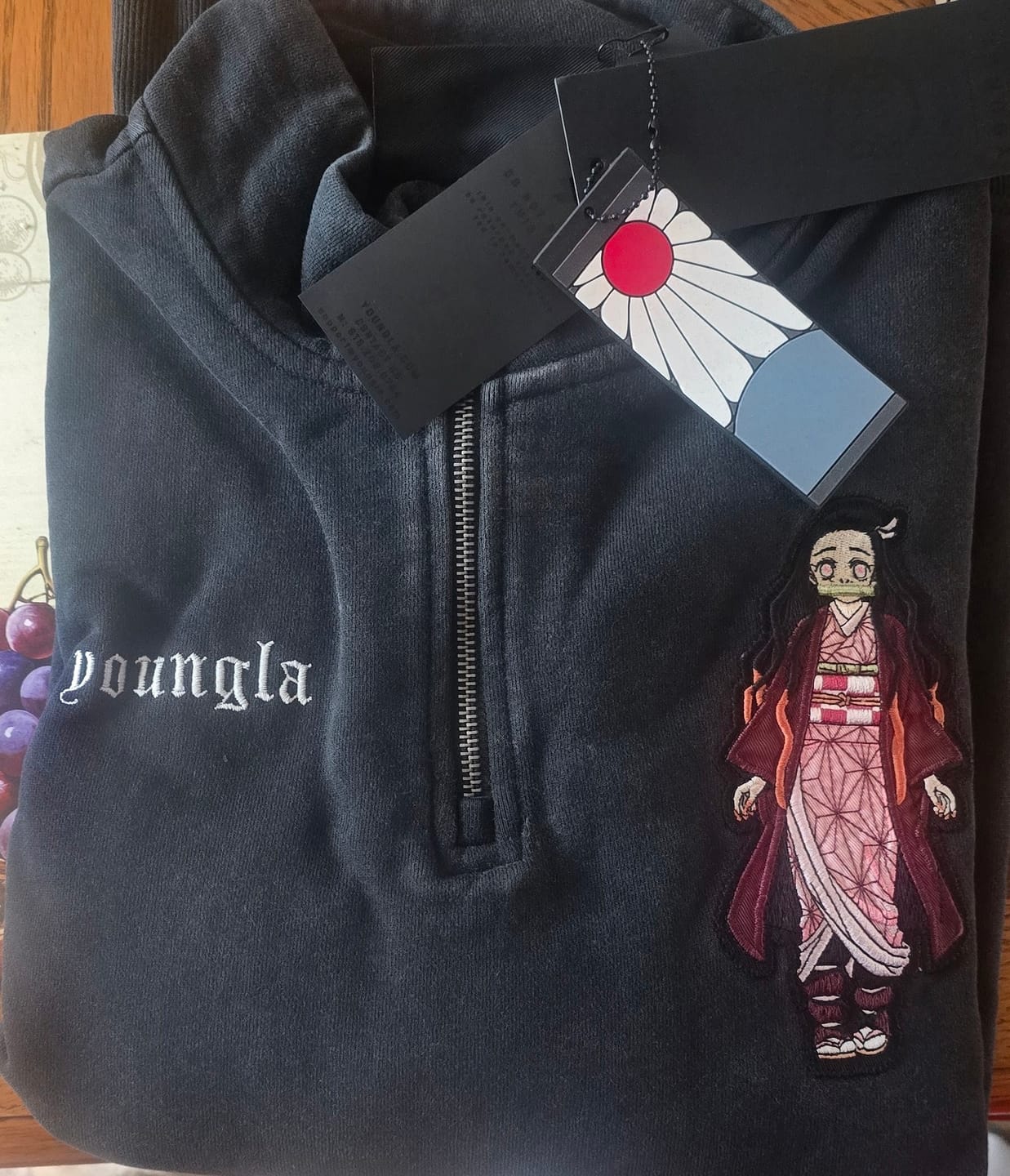 Customer photo review of 5197 - Demon Slayer: Kimetsu no Yaiba - Quarter Zip