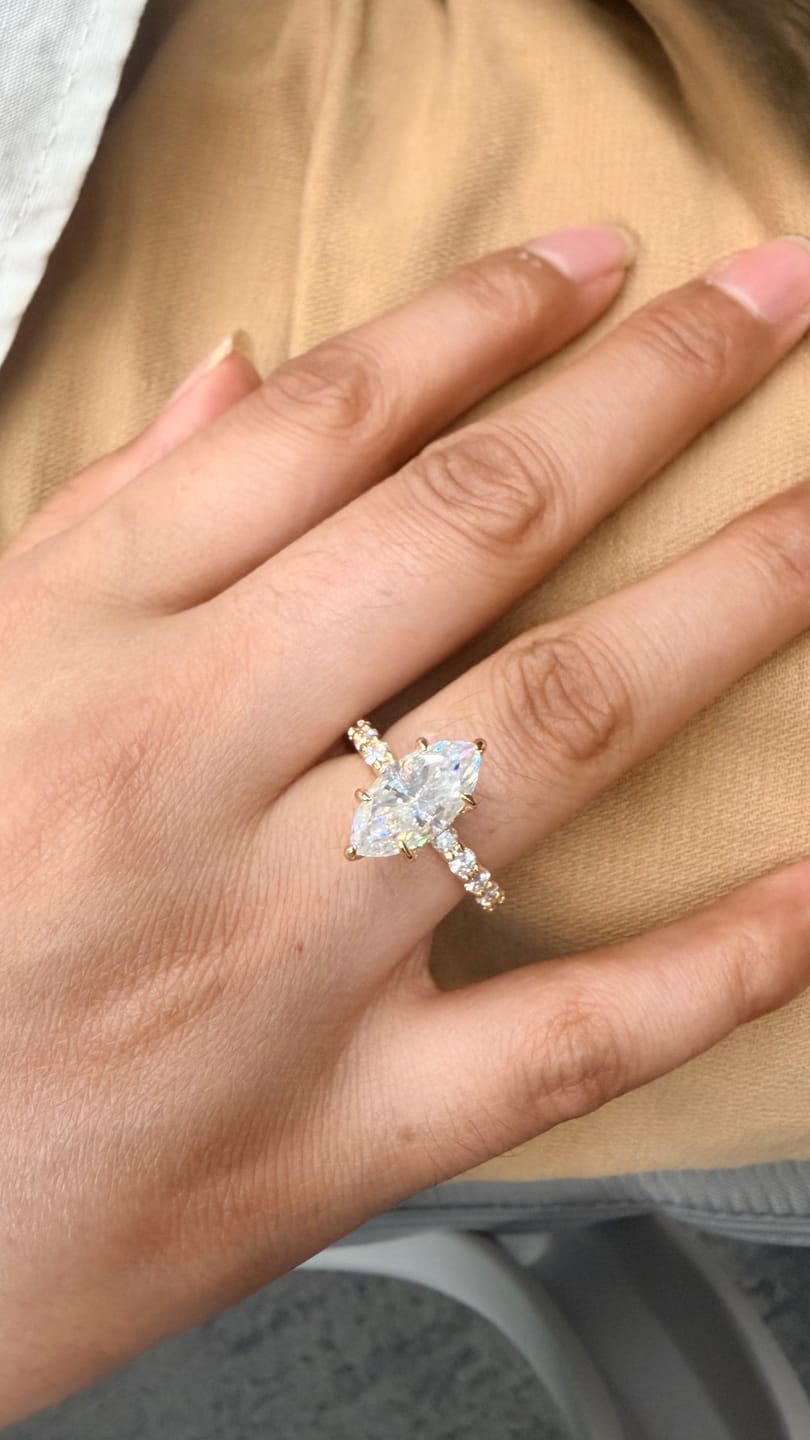 Customer photo review of S925 Moissanite 3.0 Ct Marquise Cut Side Stone Yellow Gold Engagement Ring/Wedding Set In Sterling Silver