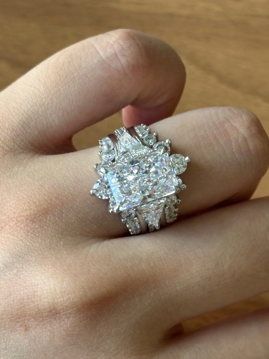 Customer photo review of S925 5.0Ct Radiant Cut Wedding Ring Set Gold Plated Side Stone Engagement Rings With Pavé Jacket Wedding Band
