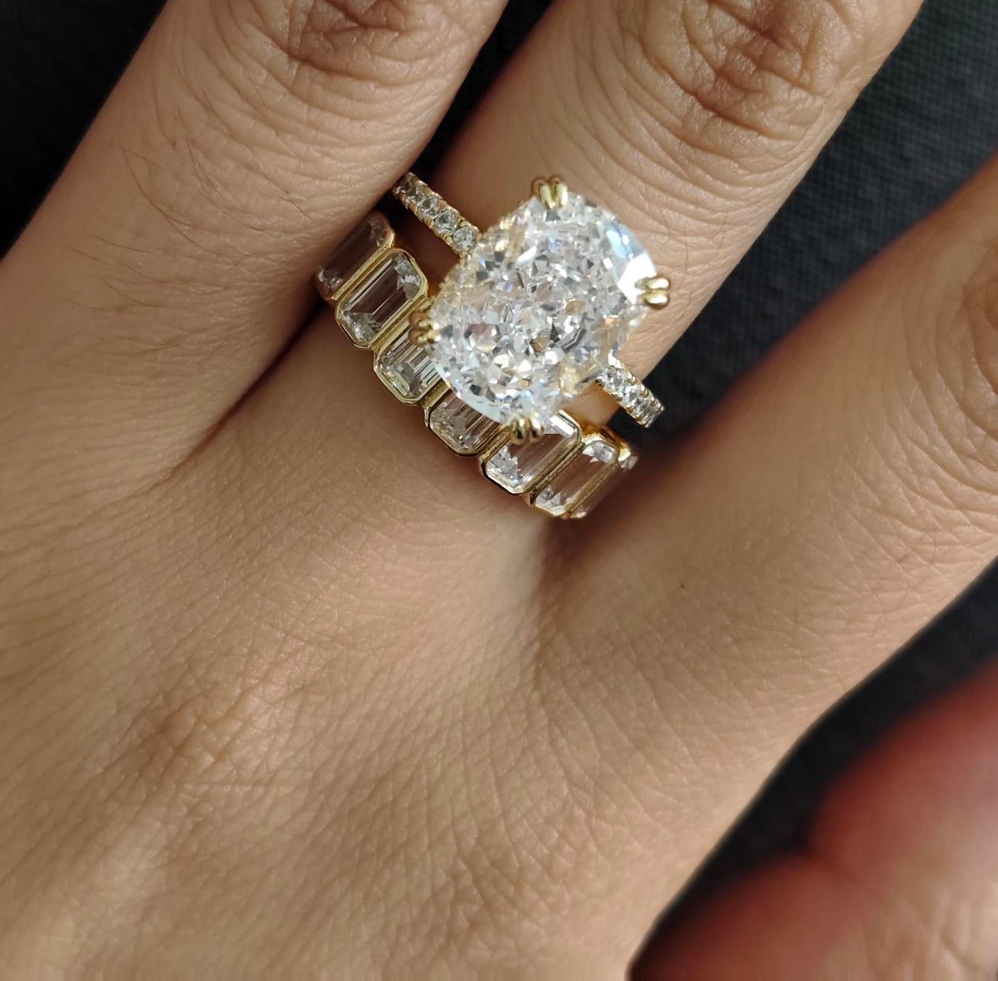 Customer photo review of S925 5.5Ct Cushion Cut Engagement Ring & 2.8Ct Emerald Cut Half Eternity Wedding Band Stackable Ring Set