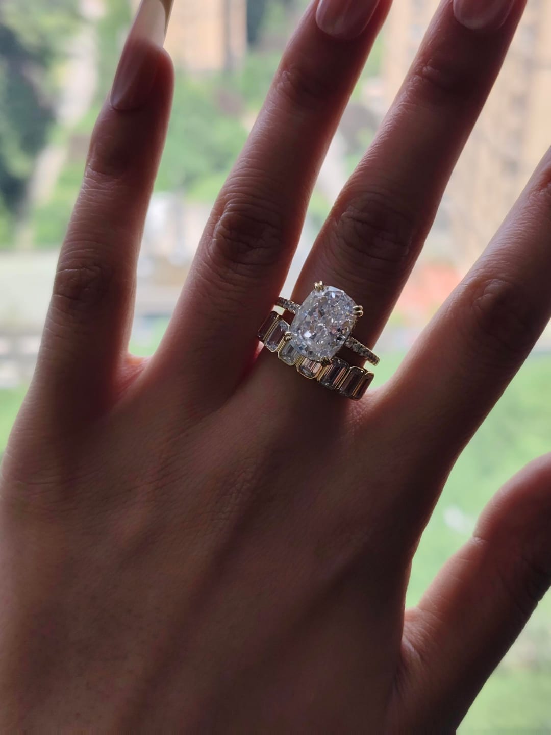 Customer photo review of S925 5.5Ct Cushion Cut Engagement Ring & 2.8Ct Emerald Cut Half Eternity Wedding Band Stackable Ring Set