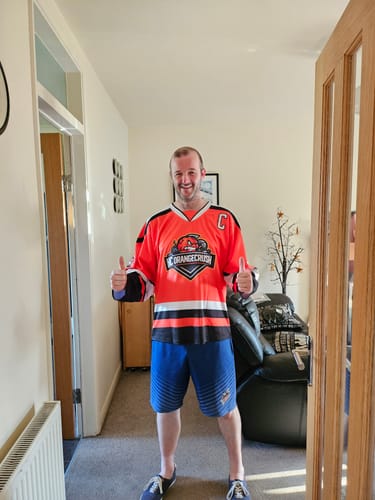 Customer photo review of Custom Black Orange-White Personalized Classic V-Neck Hockey Jersey