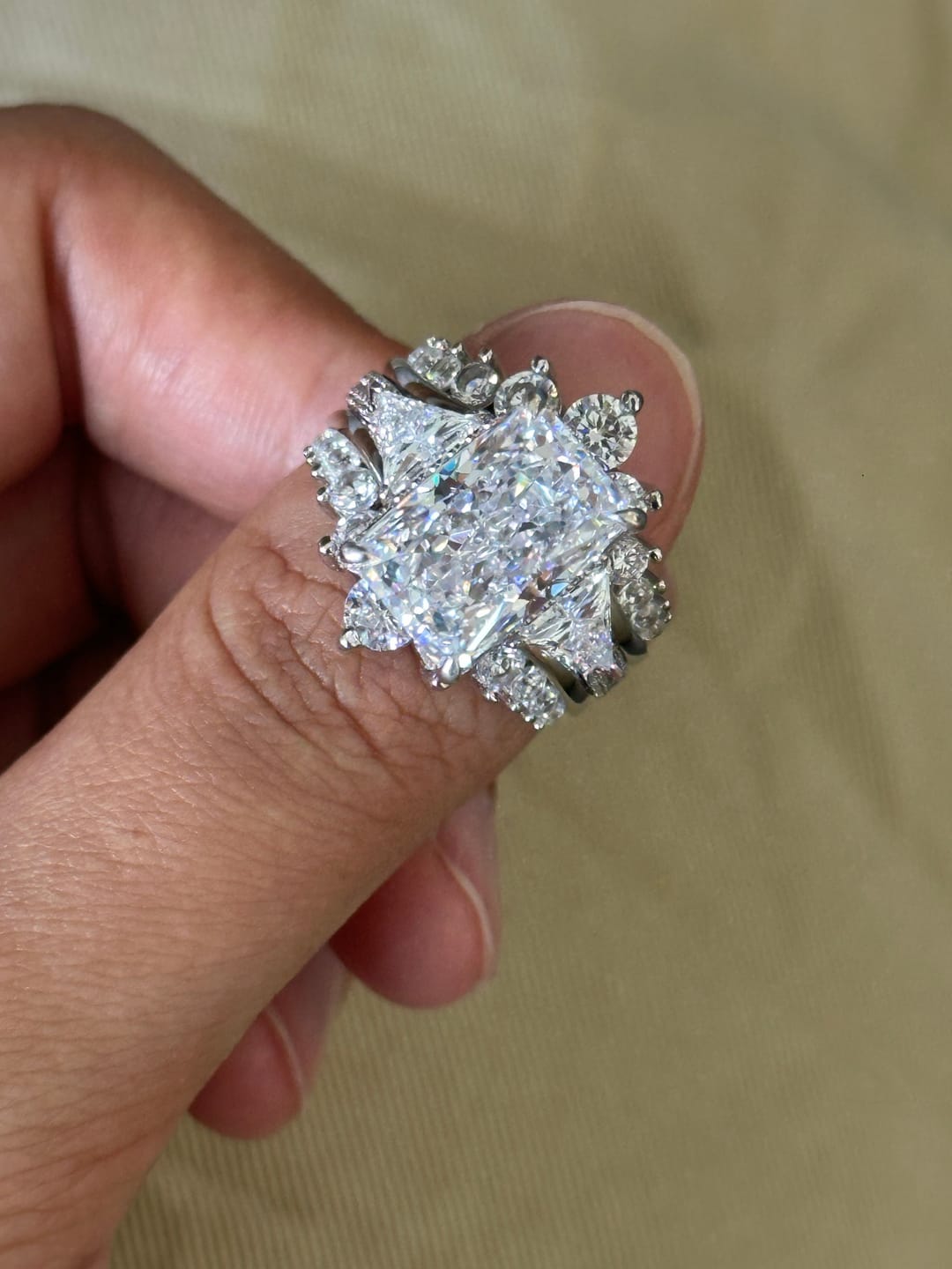 Customer photo review of S925 5.0Ct Radiant Cut Wedding Ring Set Gold Plated Side Stone Engagement Rings With Pavé Jacket Wedding Band