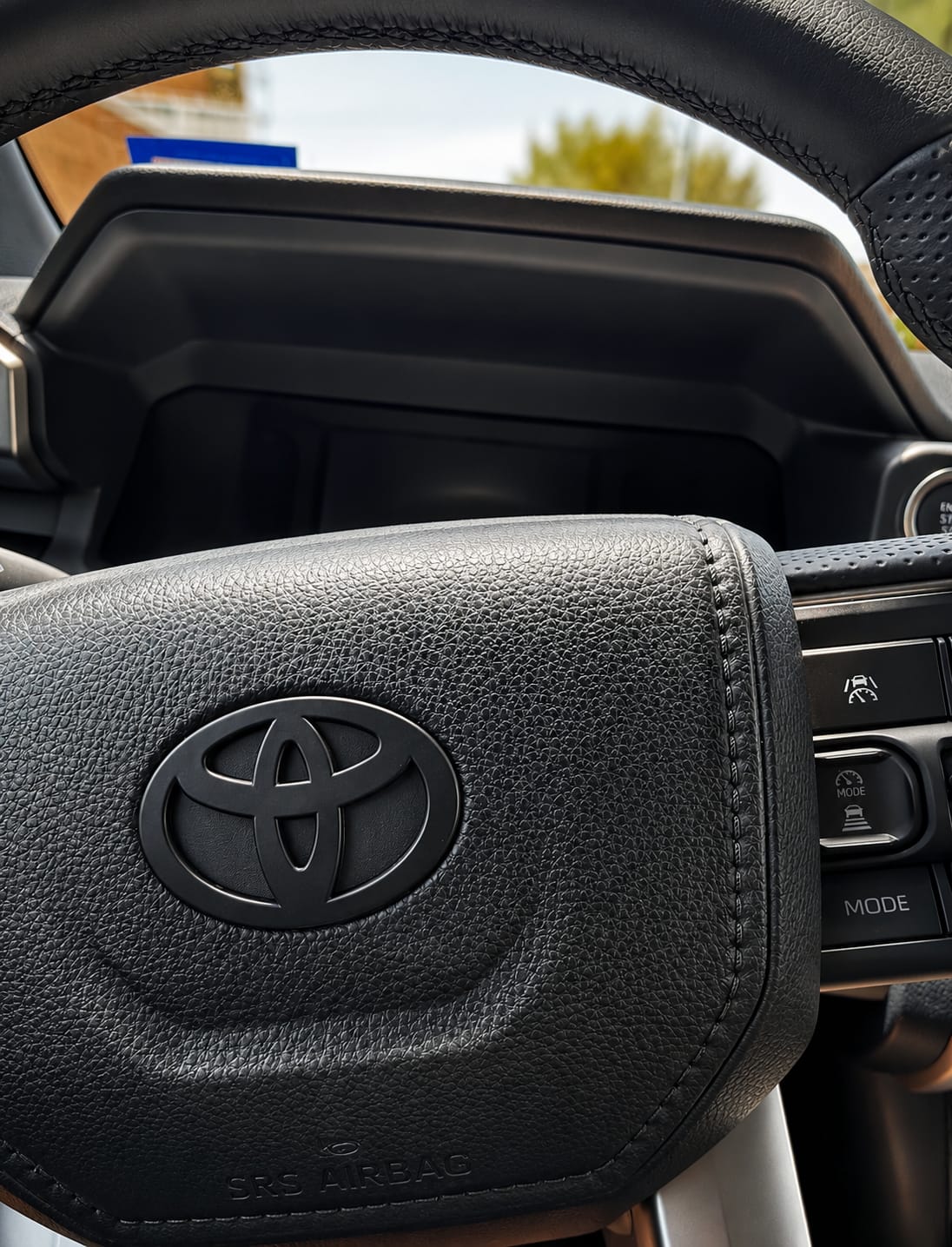 Customer photo review of NEW Black Matte Steering Wheel Emblem Fits NEW Models 2024-2026 Tacoma, 4Runner & Camry