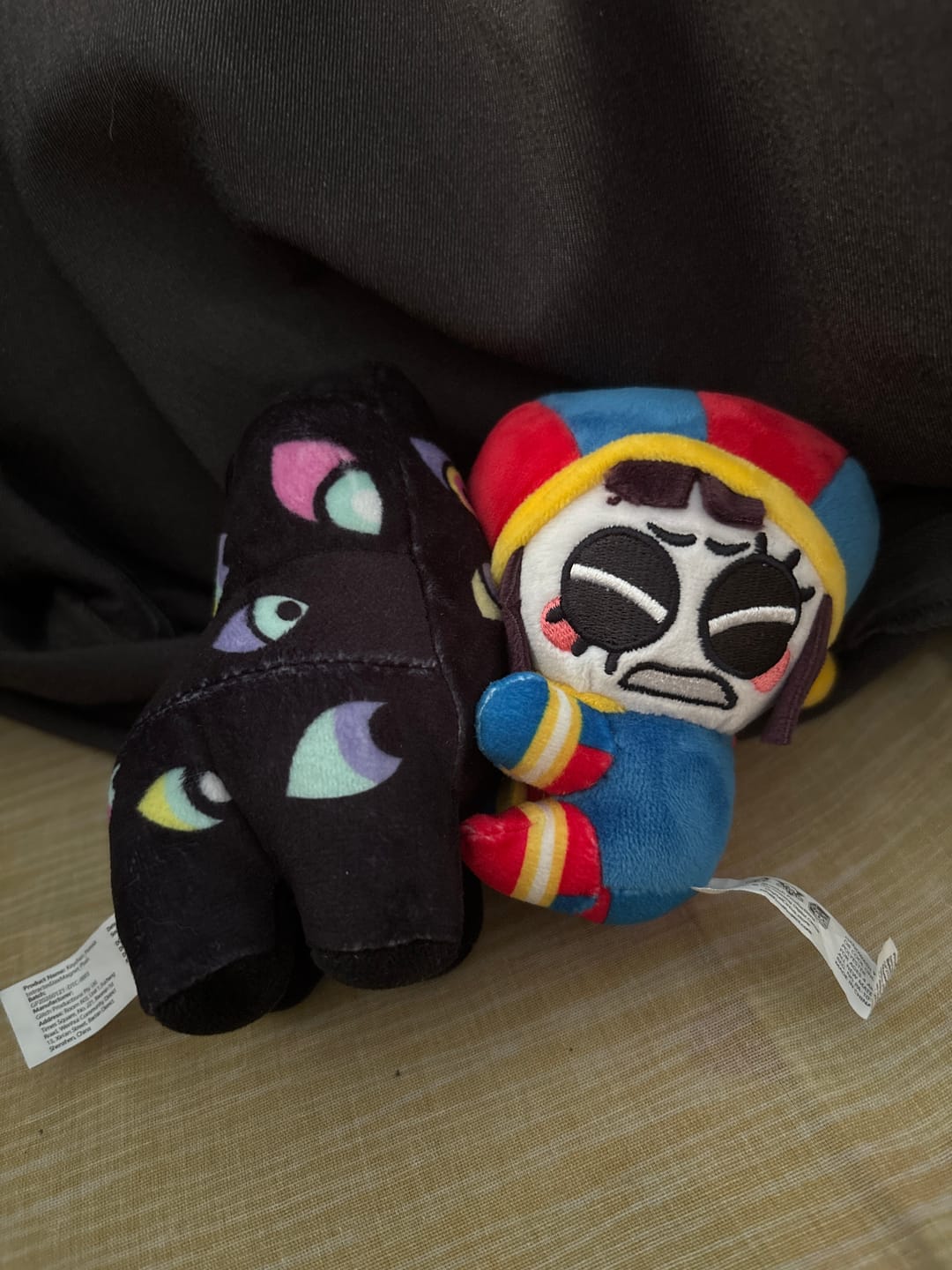 Customer photo review of Pomni & Abstraction Magnetic Plush Keychains
