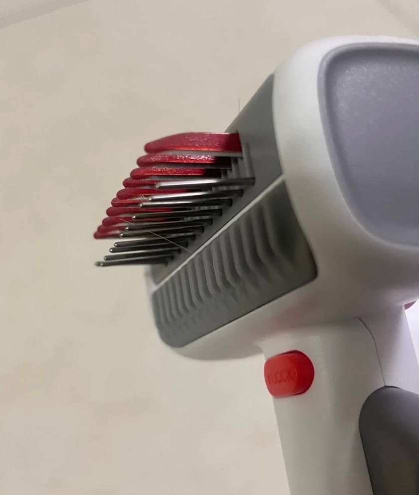 Customer photo review of 2-in-1 Pet Grooming Brush for Dogs & Cats