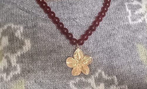 Reseña con foto de un cliente sobre Collar Borlas Marmoladas Charm Flor