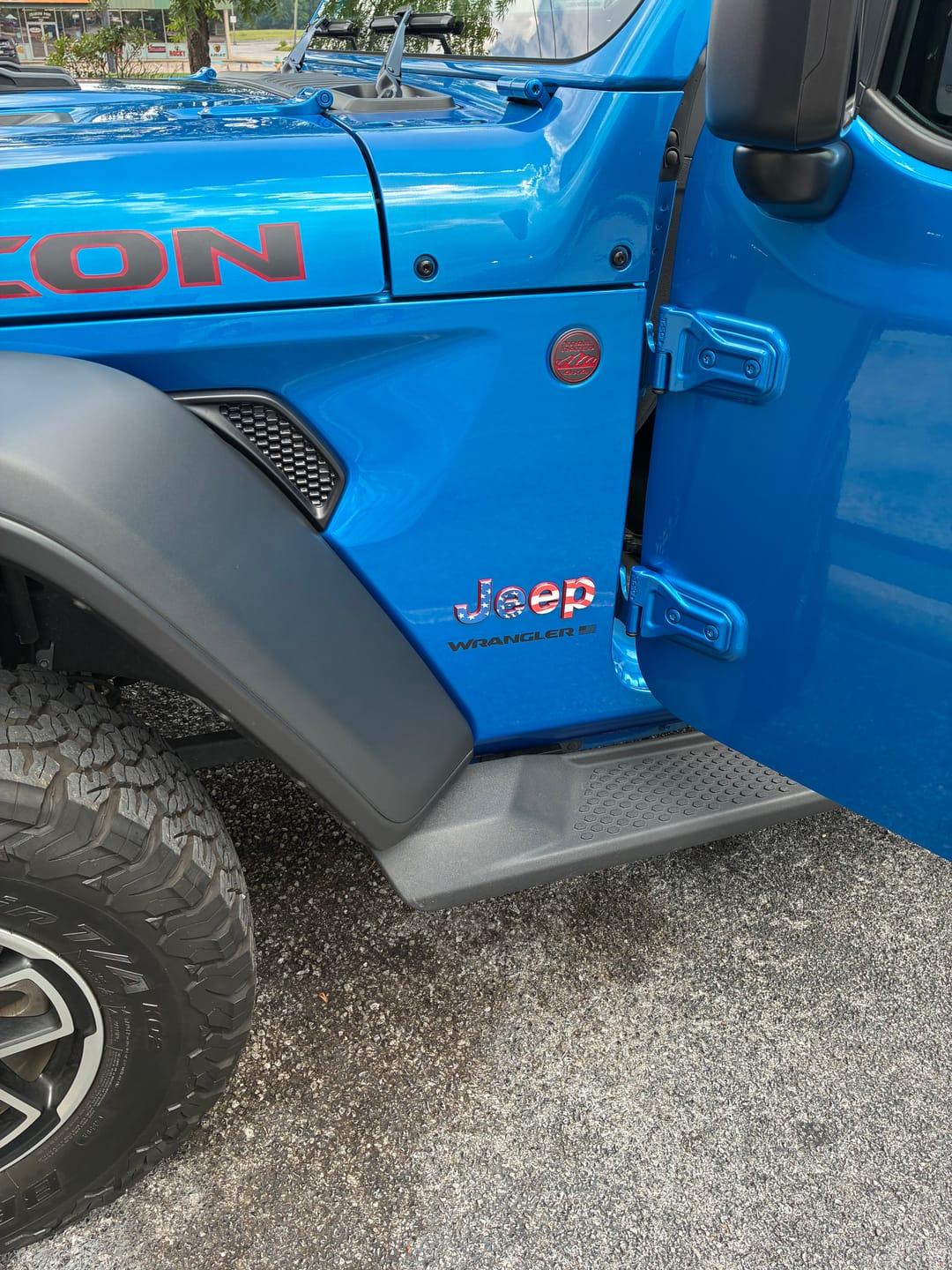 Customer photo review of JEEP Steering Wheel Emblem Overlay Decal — 30+ Colors & Designs (Flag, Topo, Animal, Solid)