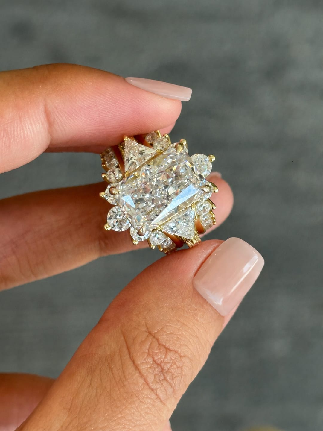 Customer photo review of S925 5.0Ct Radiant Cut Wedding Ring Set Gold Plated Side Stone Engagement Rings With Pavé Jacket Wedding Band