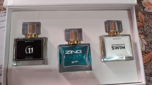 Customer's OUD Supreme BUNDLE, showing three square perfume bottles arranged in a white presentation box.