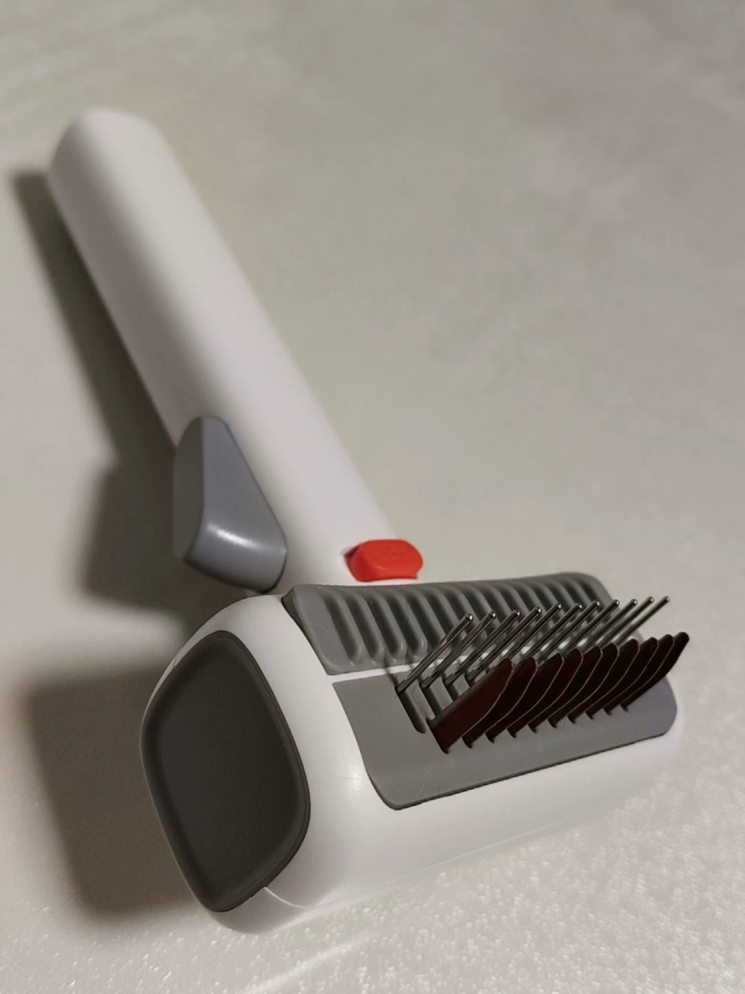 Customer photo review of 2-in-1 Pet Grooming Brush for Dogs & Cats