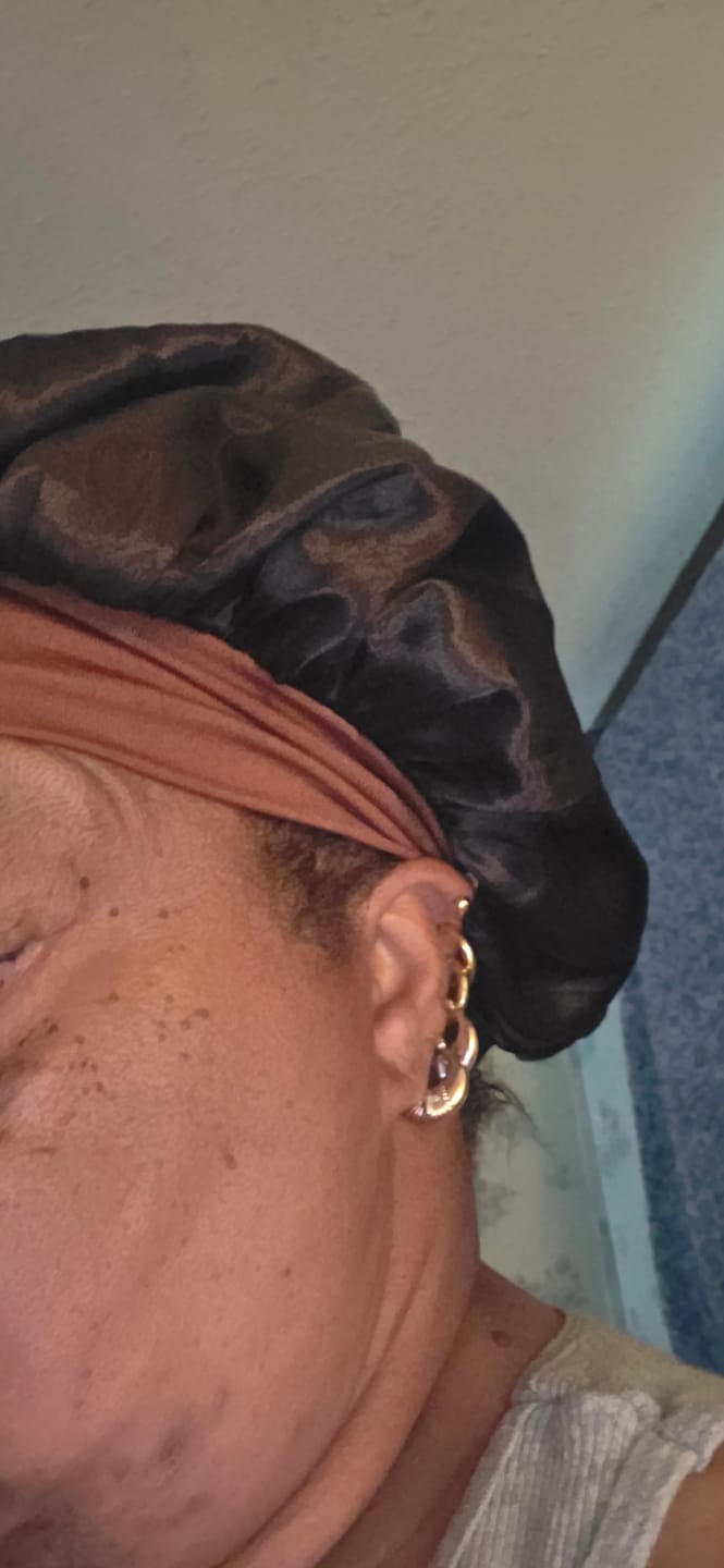 Customer photo review of Twist Hoop Earrings