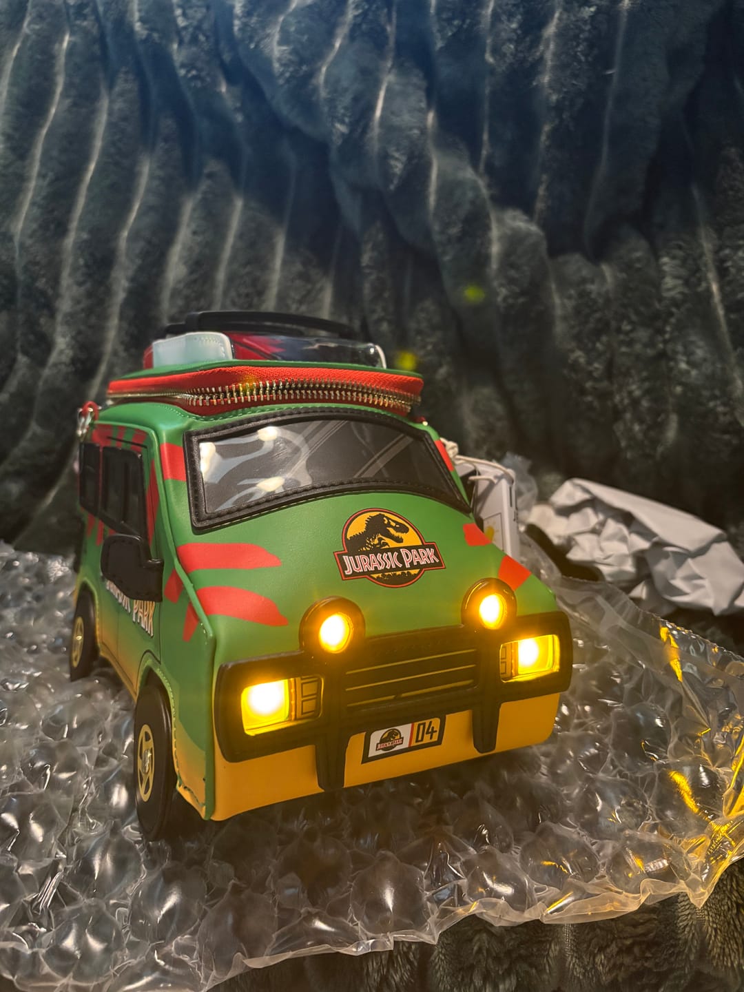 Customer photo review of Loungefly Universal Jurassic Park Safari Tour Vehicle Light Up Figural Crossbody Bag - 707 Street Exclusive
