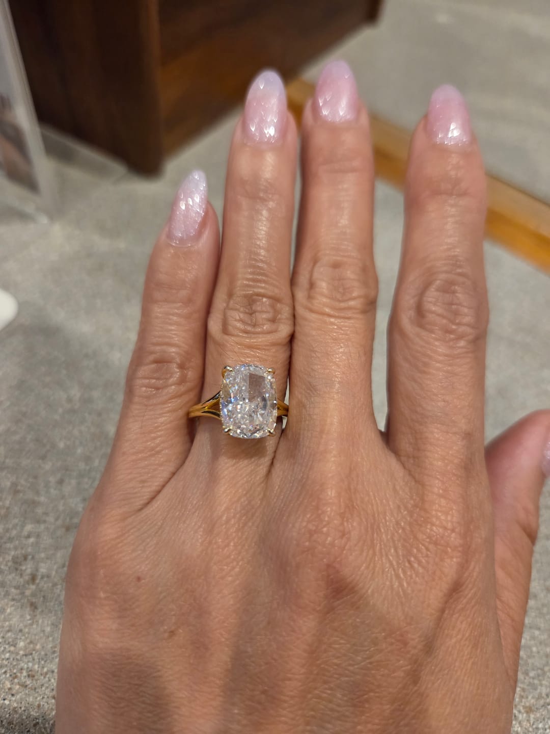 Customer photo review of S925 5.5Ct Cushion Cut Split Shank Engagement Ring Gold Plated Hidden Halo Bridal Ring For Everyday Wear