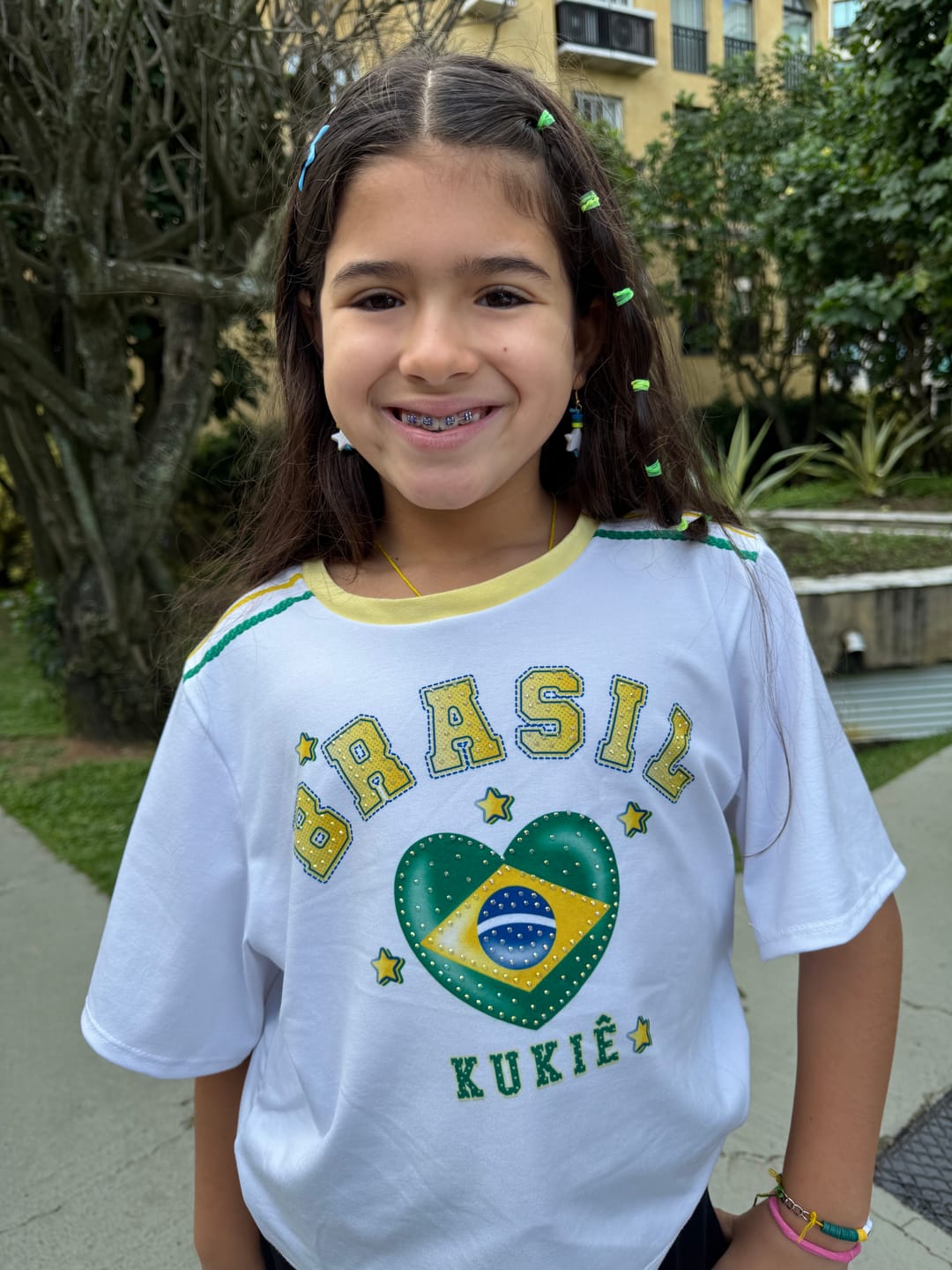 Customer photo review of Blusa em Malha Power com Bandeira Do Brasil em Formato de Coração. Estampa Nas Costas com O Número Que Faz a Torcida Kukiê Brilhar. 99742 Kukiê Infantil Menina
