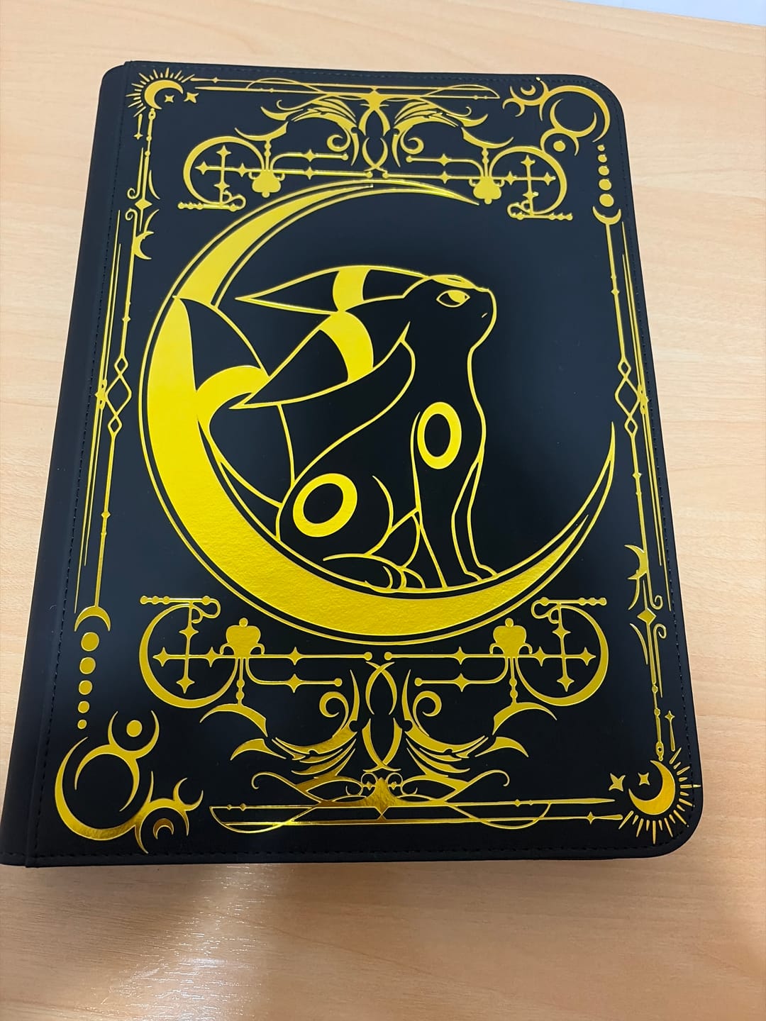 Customer photo review of Lunar Shadow 9-Pocket Trading Card Binder
