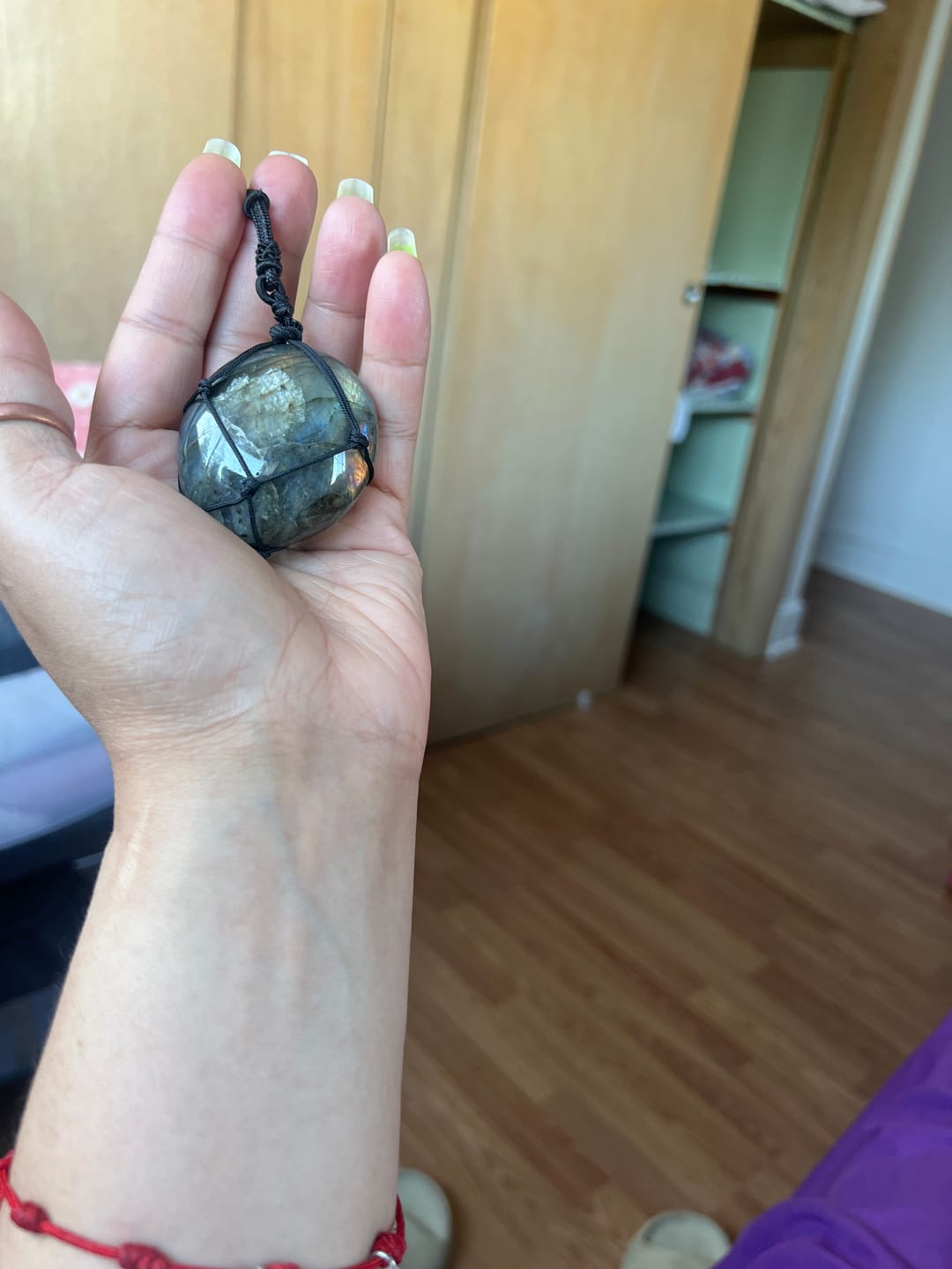 Customer photo review of Dragon's Heart Labradorite Necklace