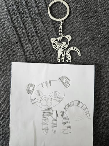 Customer photo review of Dessin d'enfant en collier ou pendentif
