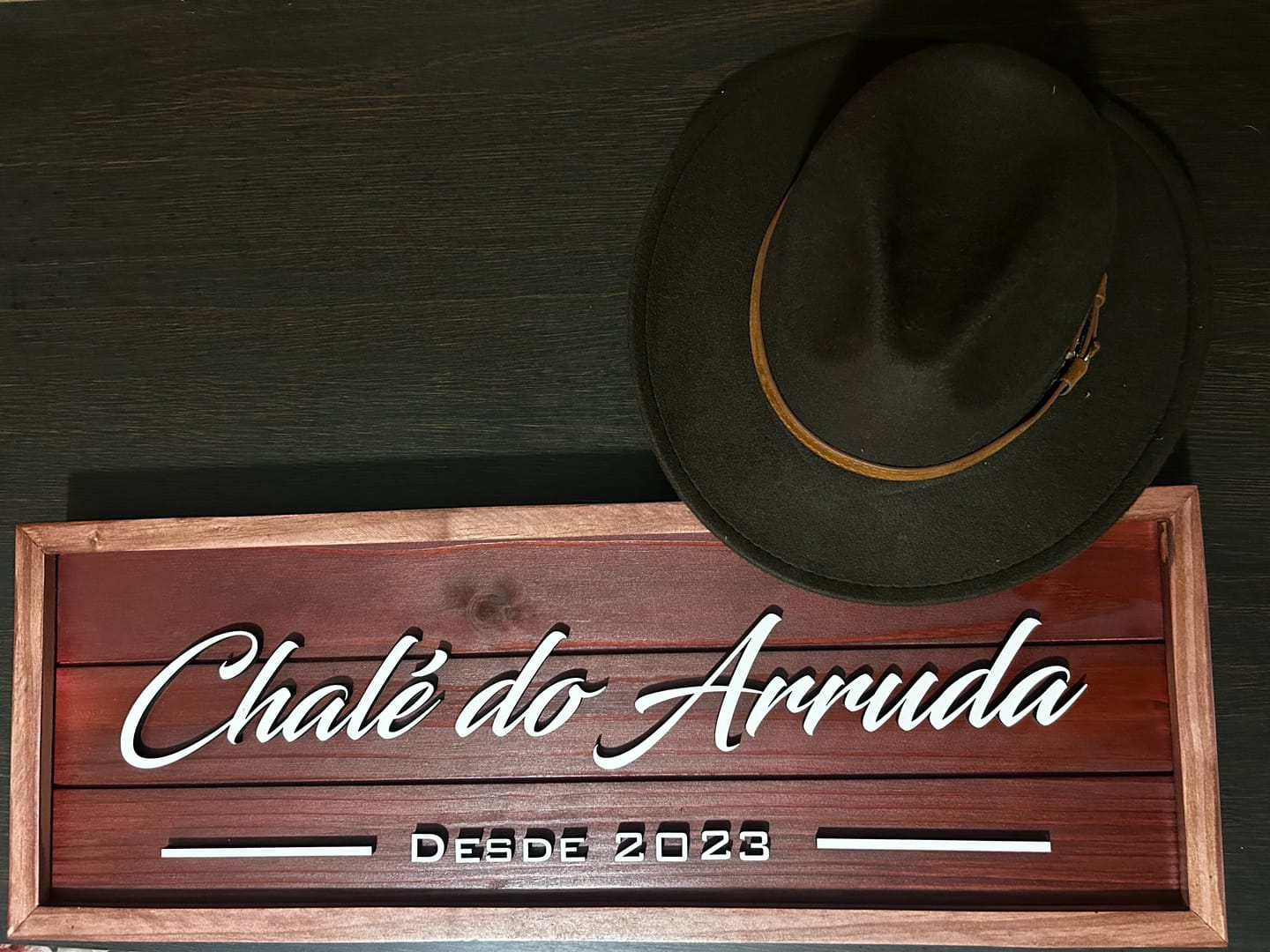 Customer photo review of Placa Sobrenome com Moldura